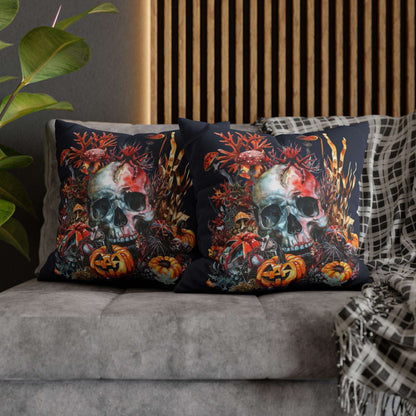 Decorative pillow cases with a double-sided  design of a skull and pumpkins design on a dark background.