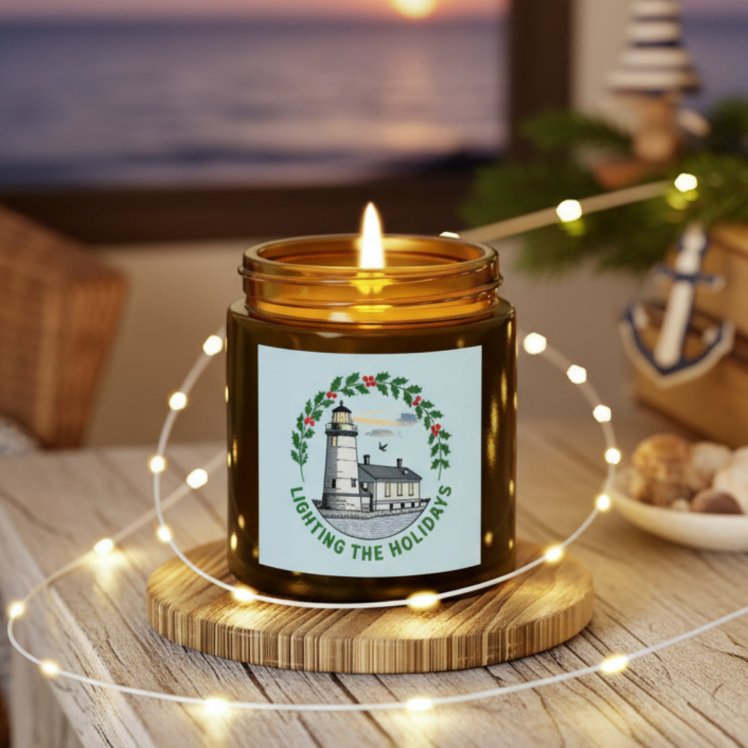 Candle in a jar with a decorative label on a wooden coaster surrounded by string lights, with a guitar in the background.