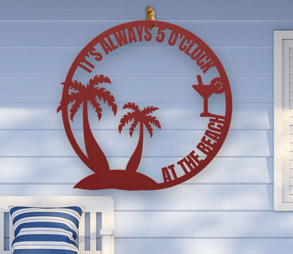 Red metal wall art featuring palm trees and a cocktail glass with the phrase "It’s 5 0’Clock Beach" in a playful beach theme, available in 6 sizes.