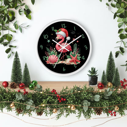 Wall clock with a flamingo wearing a Santa hat on a black background, surrounded by decorative elements.