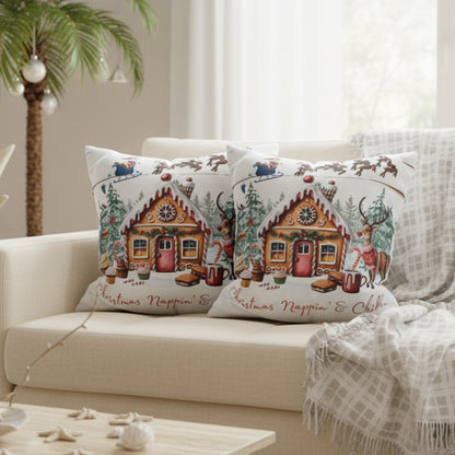 Decorative pillows with gingerbread house design on a sofa