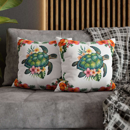 Two 16" x 16" white pillowcase with hibiscus flowers and a sea turtle design.