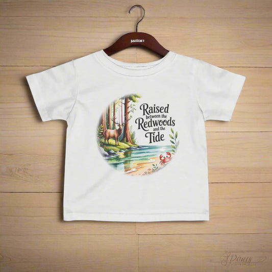 White t-shirt with nature-themed graphic and text on a white background