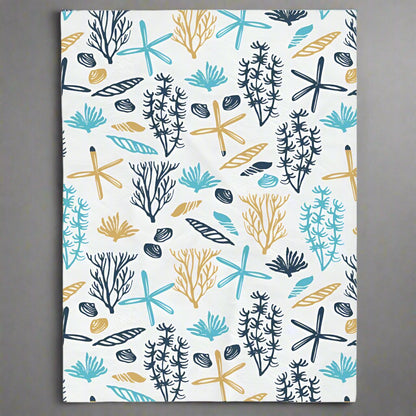 30x40 White velveteen blanket with seashells, underwater plants, starfish in blue and yellows