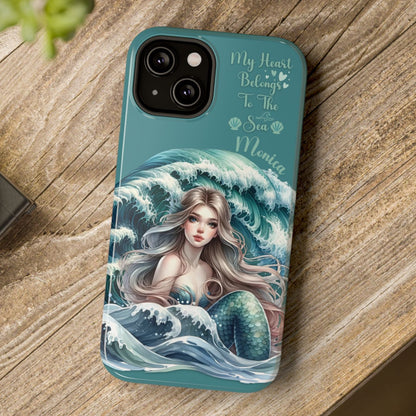 Phone case with mermaid design on a wooden surface
