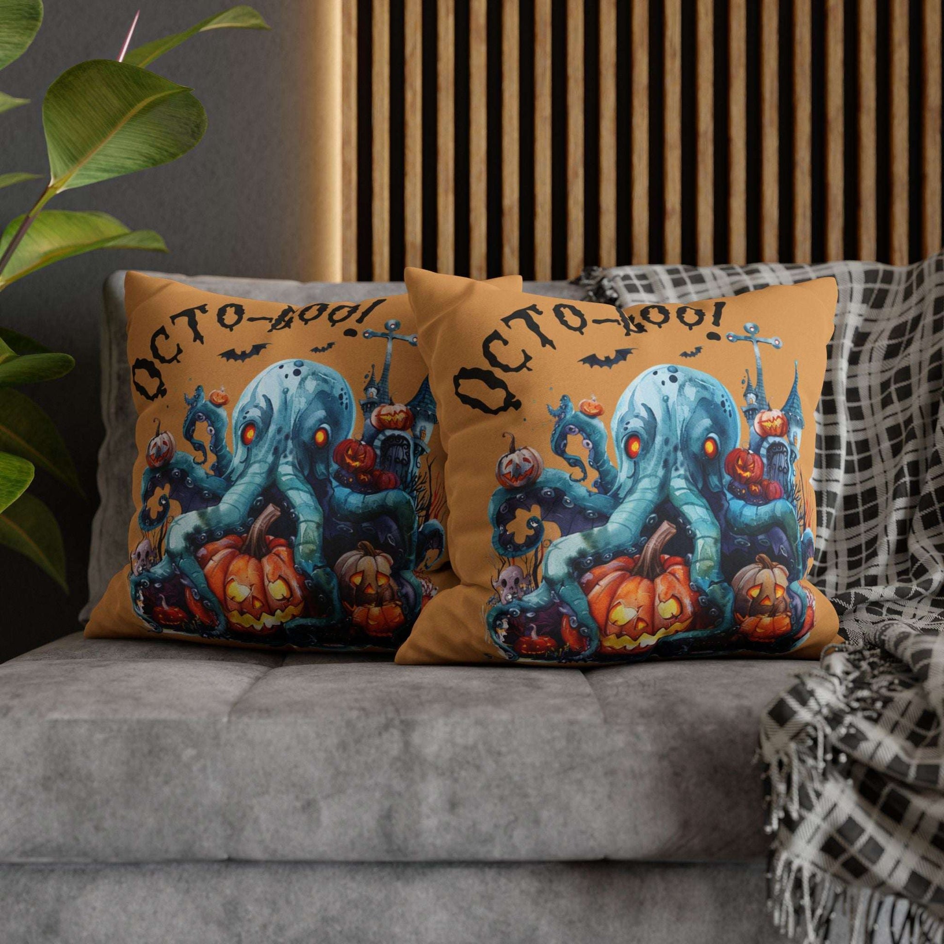 Halloween-themed double-sided decorative pillowcases with octopus and pumpkins that says Octo-Boo!