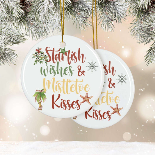 Circle double-sided ceramic ornament featuring the phrase “Starfish Wishes & Mistletoe Kisses” with coastal holiday artwork on both sides.