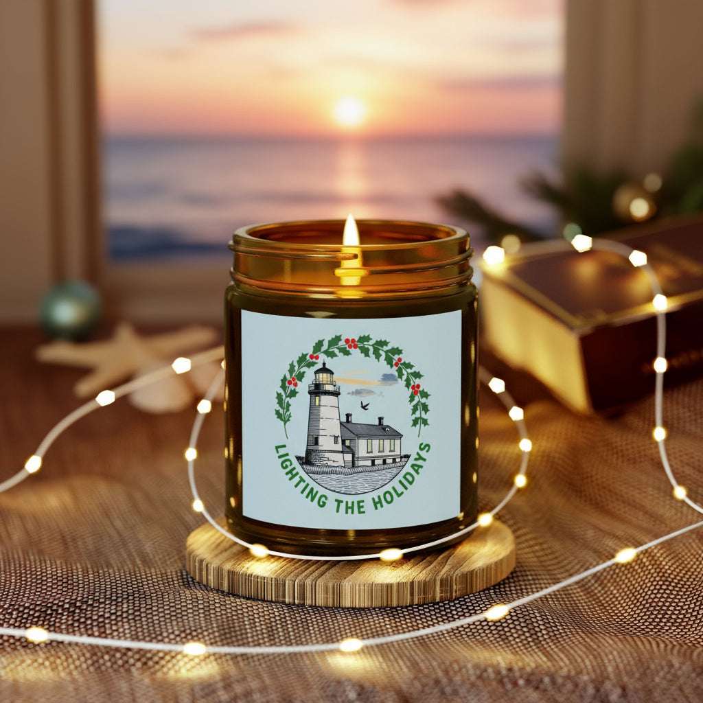 Candle in a jar with a decorative label on a wooden coaster surrounded by string lights and a guitar in the background.