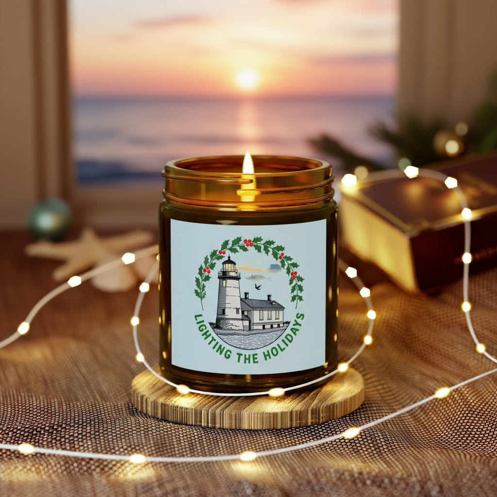 Candle in a jar with a decorative label on a wooden coaster surrounded by string lights and a guitar in the background.