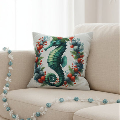 Decorative pillow with a seahorse design on a gray couch