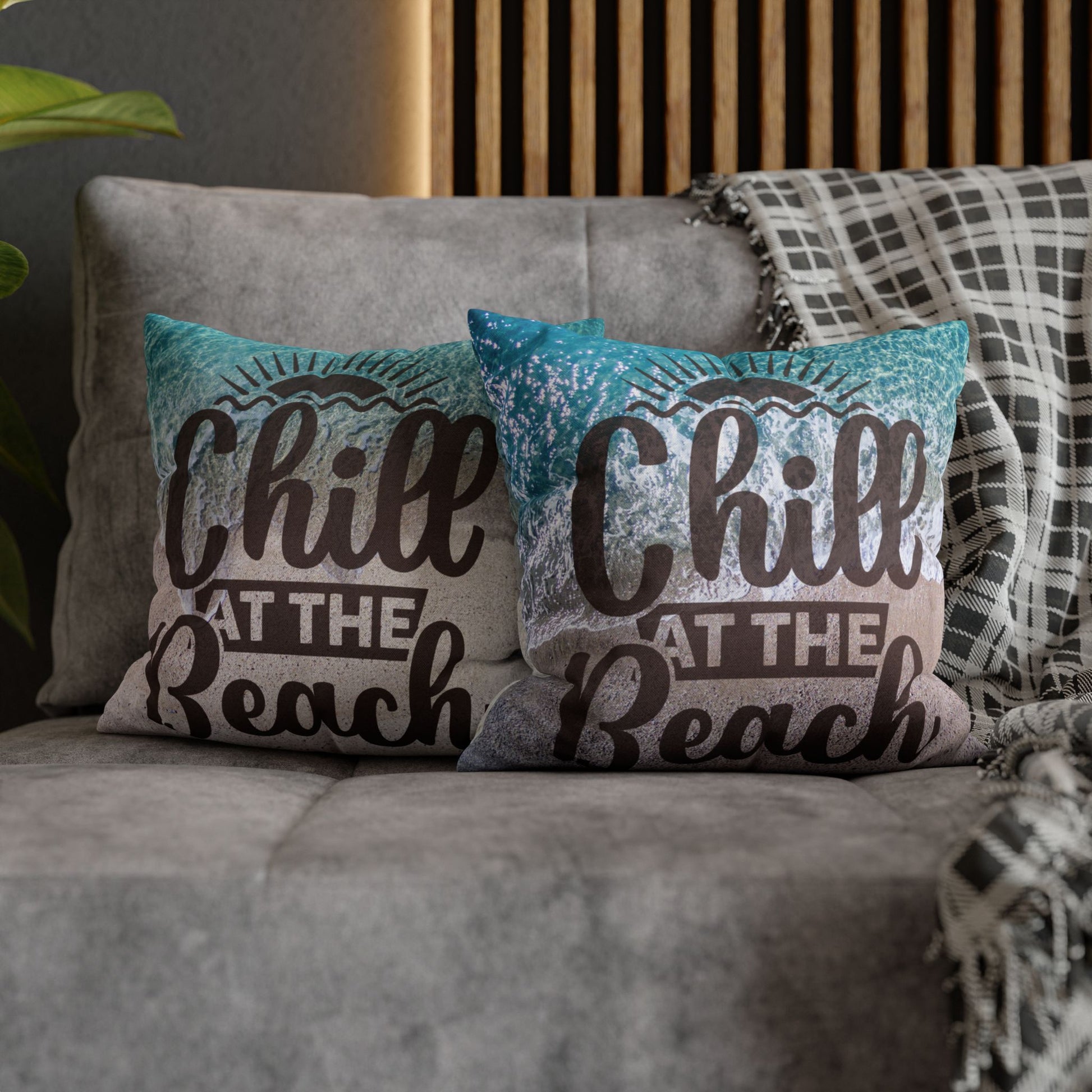 Two 14" x 14" decorative pillows with 'Chill at the Beach' text on a beach background. 