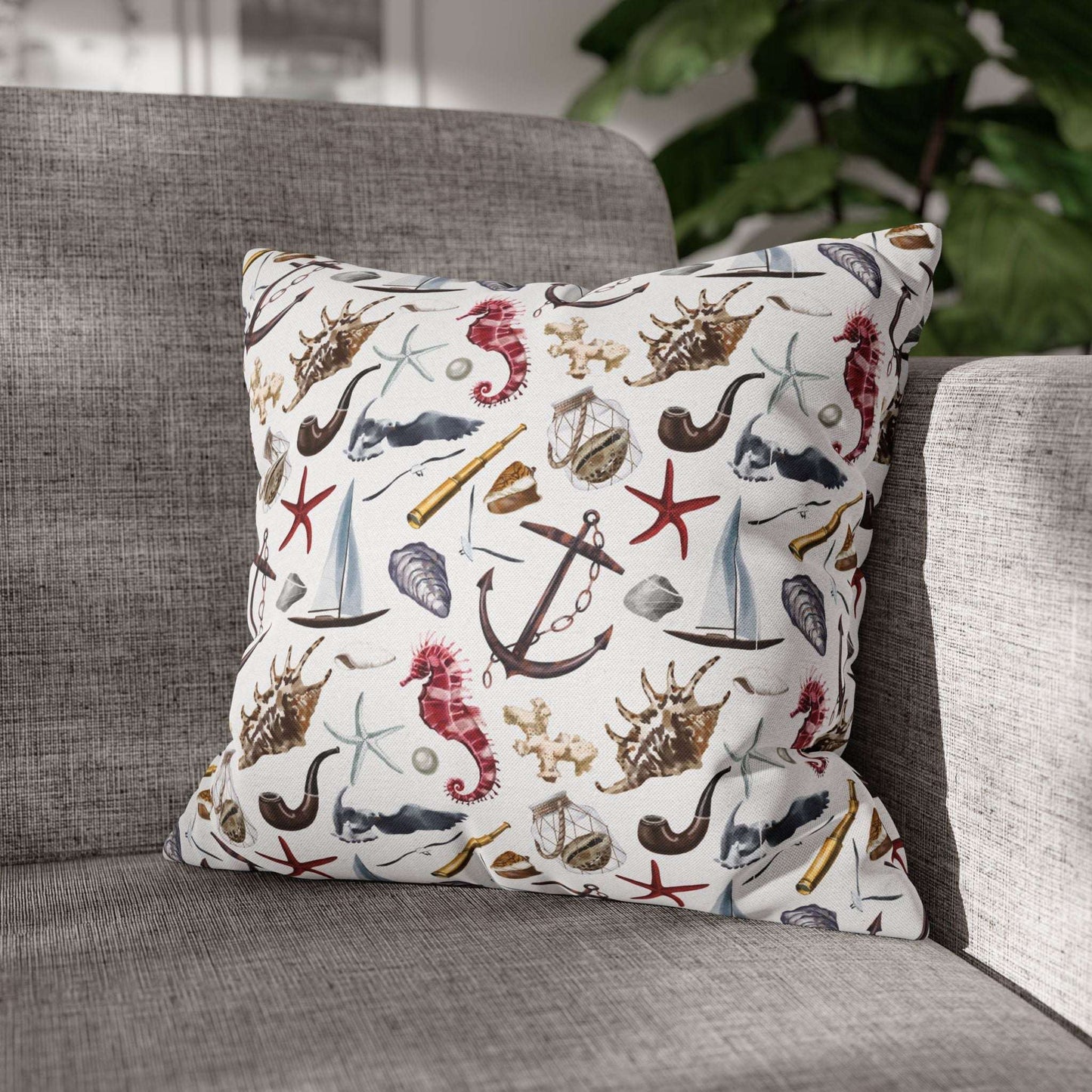 16" x 16" white pillowcase featuring detailed graphics of anchors, seashells, sailboats, and seahorses in a nautical-themed pattern.