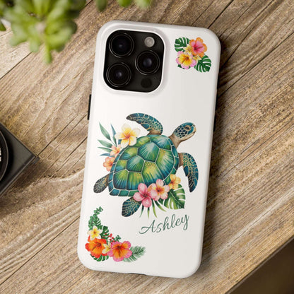 iPhone 15 case with a white background and a sea turtle with hibiscus flowers, with more hibiscus flowers around the sides.
