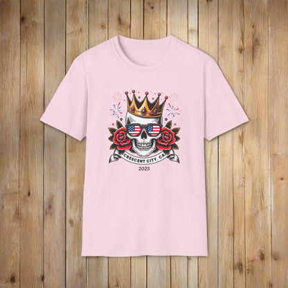 Pink T-shirt with a graphic of a skull, roses, crown, and Crescent City, CA text below.