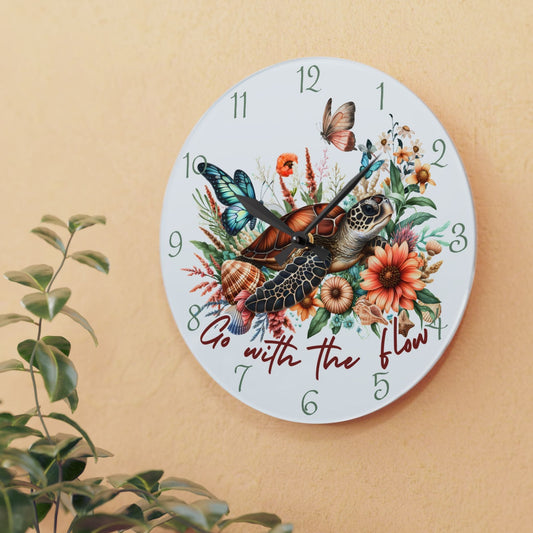 Decorative wall clock with sea turtle and floral design with text Go with the Flow.