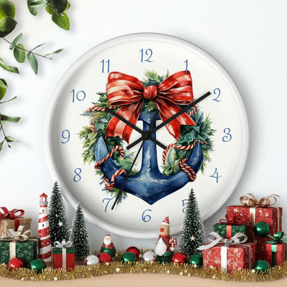 Decorative wall clock with anchor and bow design on a white background