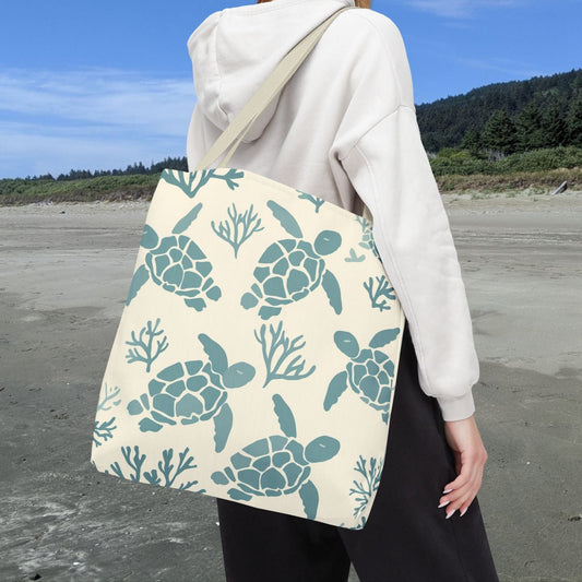 Natural beige 18" x 18" tote bag featuring sage green sea turtles in a repeating coastal pattern.