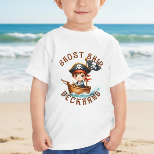 Child wearing a 'Ghost Ship Deckhand' shirt.