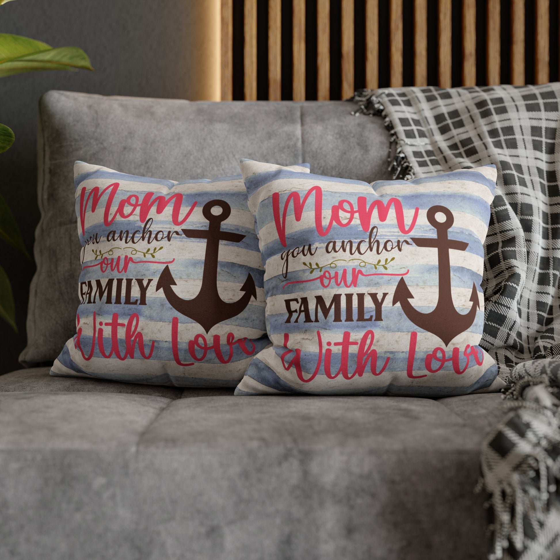 Two 14" x 14" Decorative pillow blue and white striped pillowcase with an anchor design and the words “Mom is the Anchor of Our Family.”