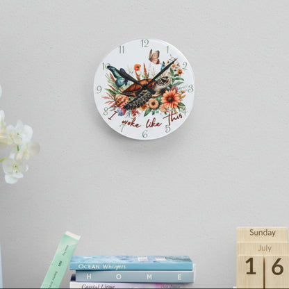 Decorative wall clock with floral and sea turtle design with text Go with the flow.