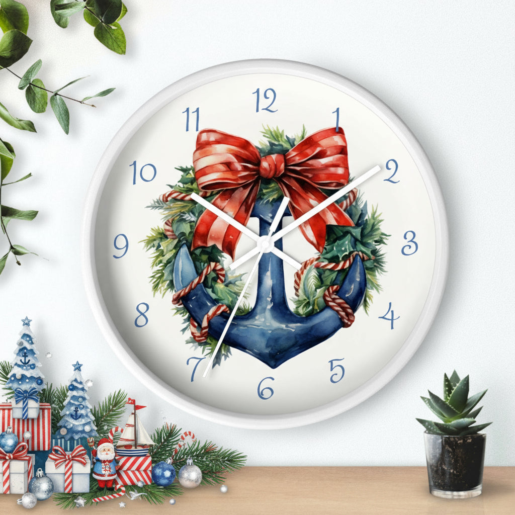 Decorative wall clock with a wreath and bow design on a white background.