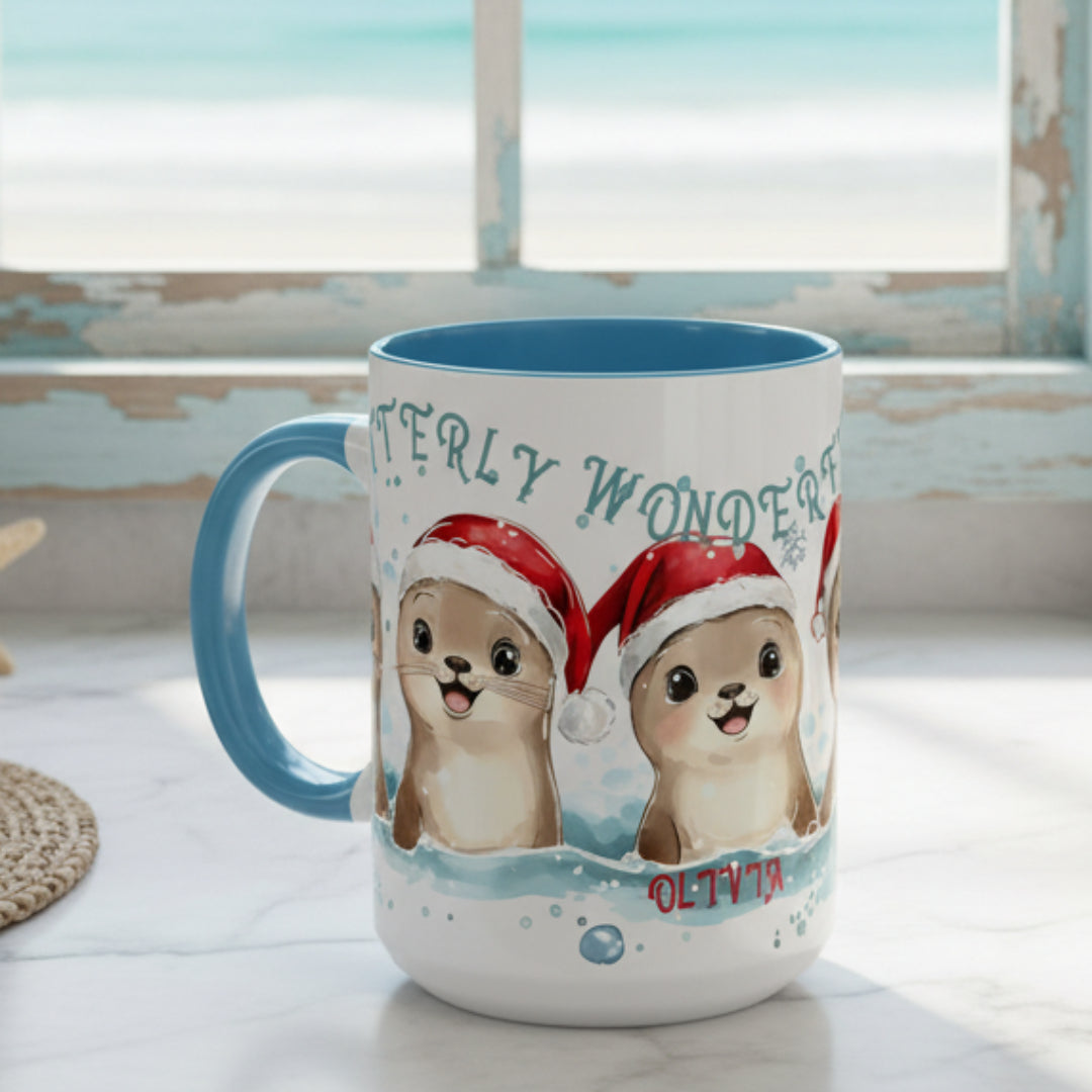 Mug with cartoon otters wearing Santa hats and 'Otterly Wonder' text on a white background