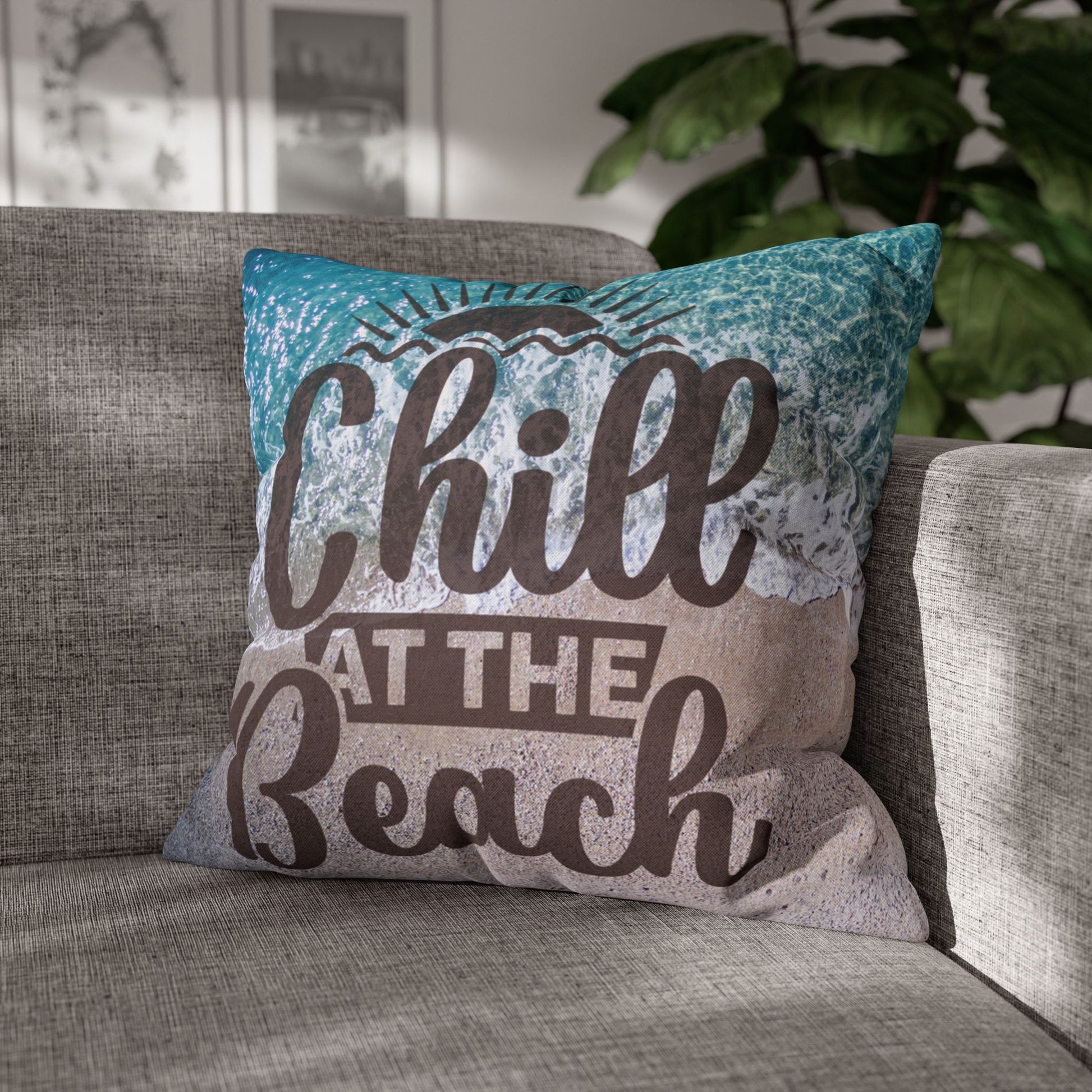 20" x 20" Decorative pillow with 'Chill at the Beach' text on a beach background. 