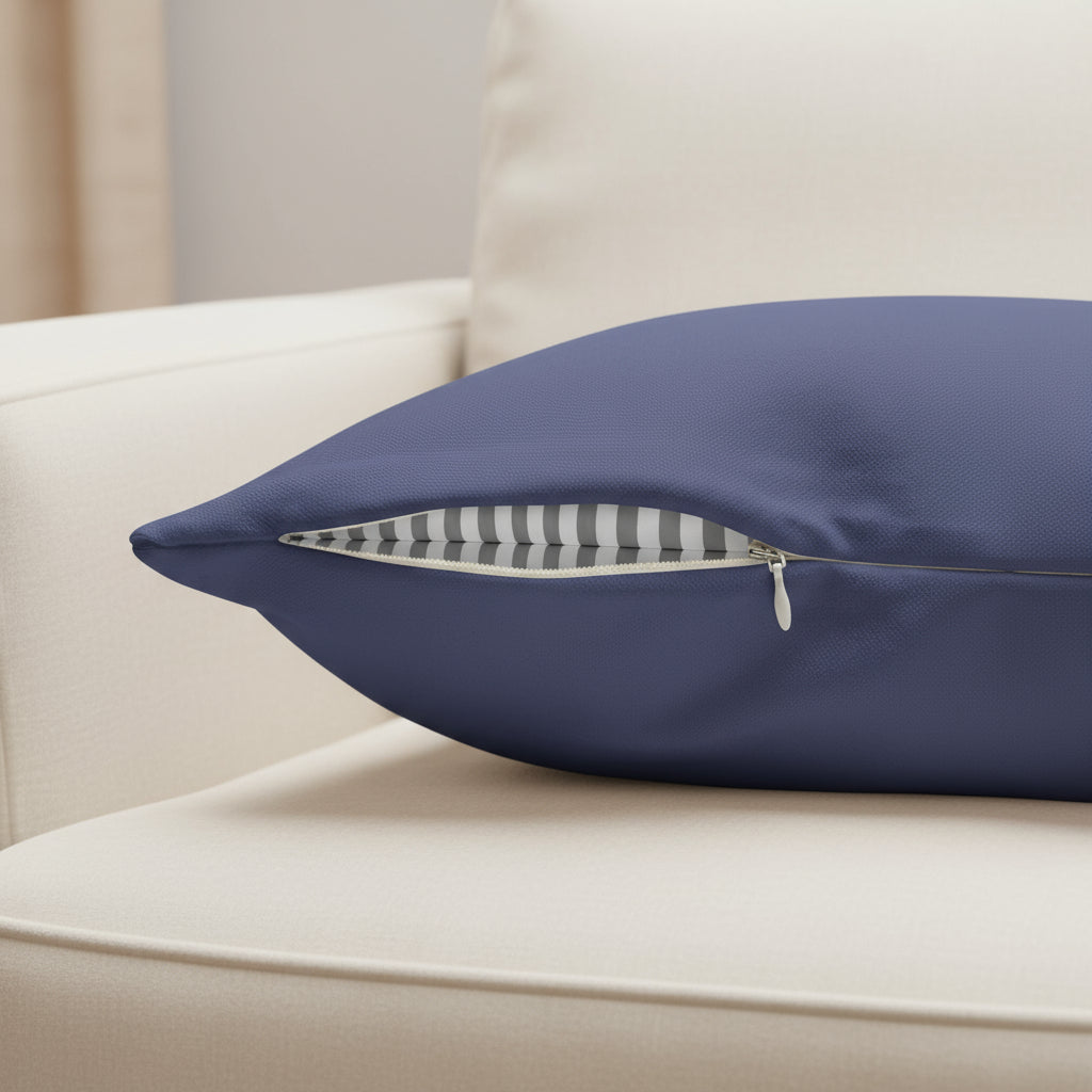 Blue pillow with a zipper opening to reveal the ease of removal.