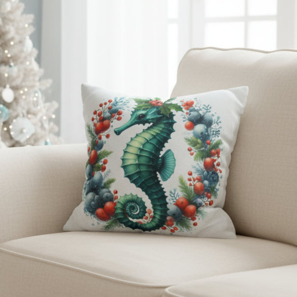 Decorative pillow with a seahorse design on a gray couch