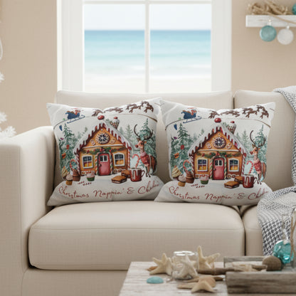 Decorative pillows with gingerbread house design on a  sofa.