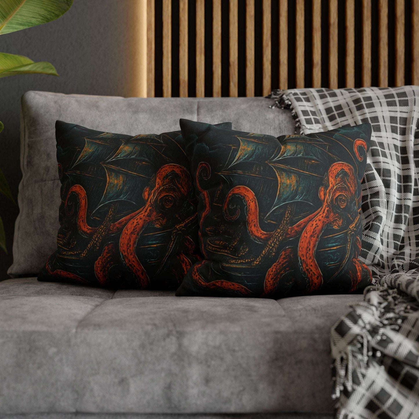 16" x 16" Black pillowcase with a design of a large octopus enveloping an old sail ship.
