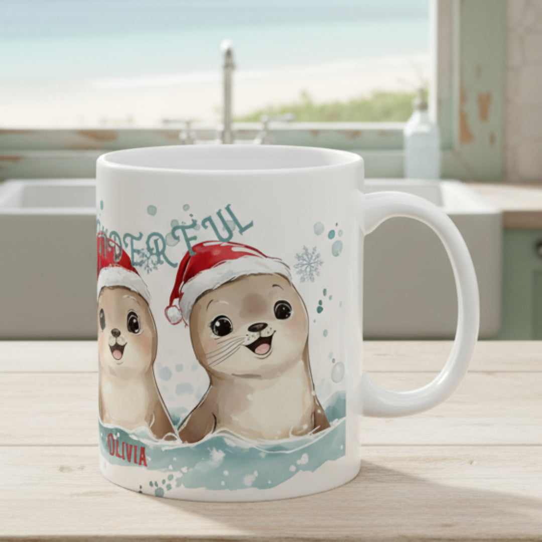 White mug with cartoon seals wearing Santa hats and snowflakes on a white background
