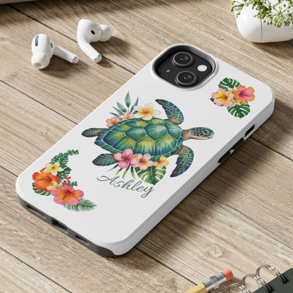iPhone 14 case with a white background and a sea turtle with hibiscus flowers, with more hibiscus flowers around the sides.