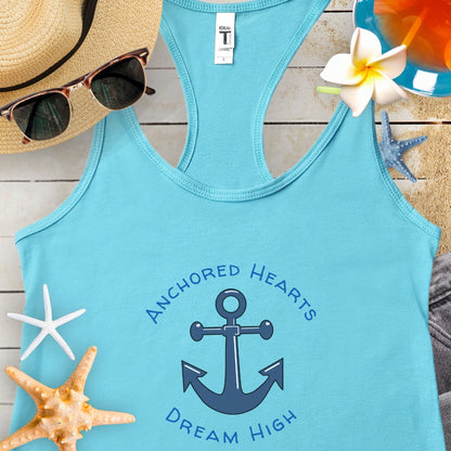 Tahiti Blue Tank Top with anchor that says Anchored Hearts Dream High