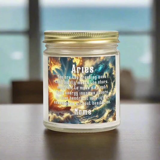 Elegant Cancer Zodiac hand-poured coconut apricot wax scented candle in a 9 oz clear glass jar with gold lid, featuring a scene of crashing waves with a man in the distance on a rock with the bright sun shining off of the waves and an inspirational quote personalized. A beach-inspired astrology gift, perfect for relaxation and decor.