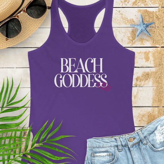 Purple Racerback Tank Top with the text Beach Goddess with a crown hanging off of the bottom of the text -stylish tank is great for vacations, beach days, or casual wear.