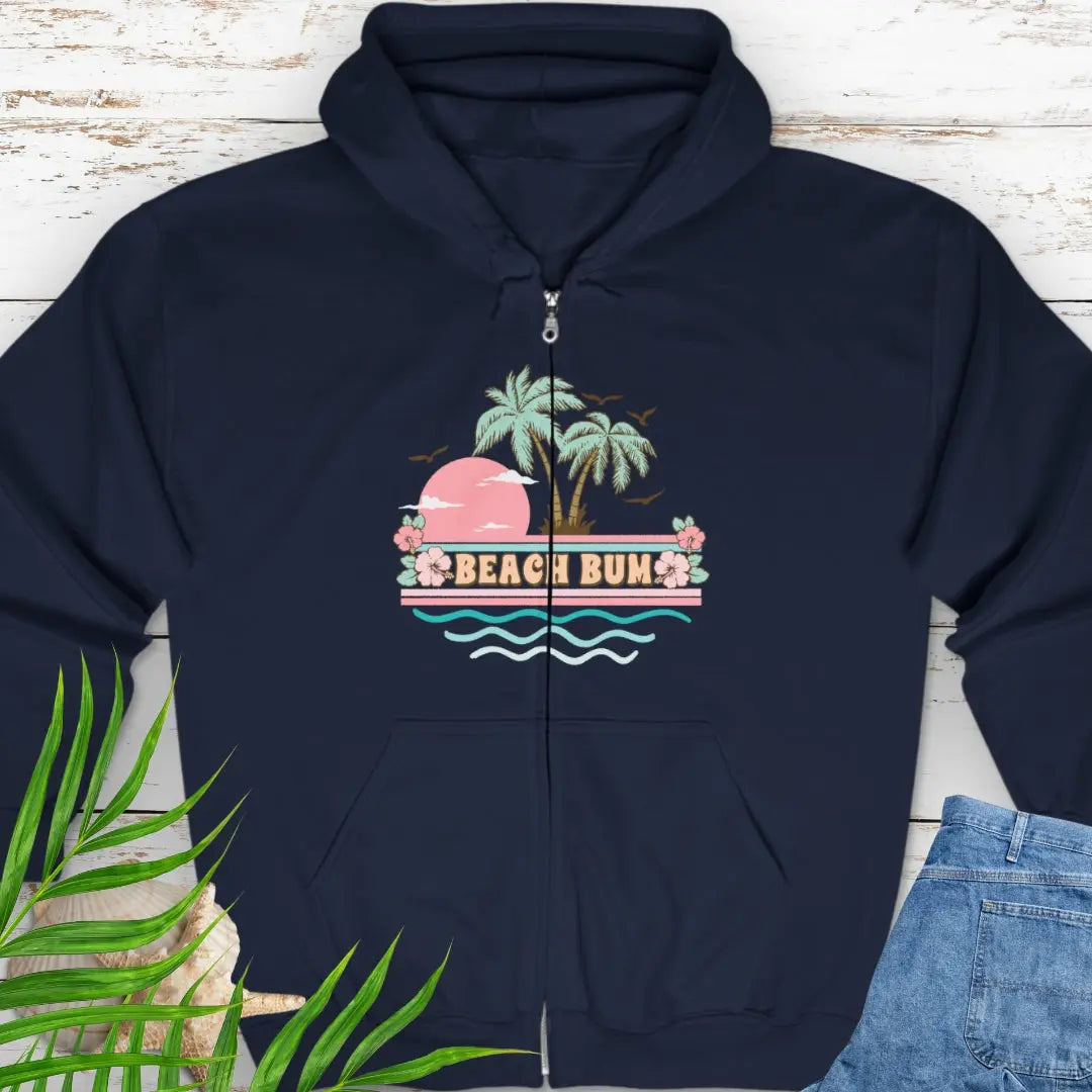 A pastel retro beach scene that says Beach Bum Navy zippered sweatshirt with hood.