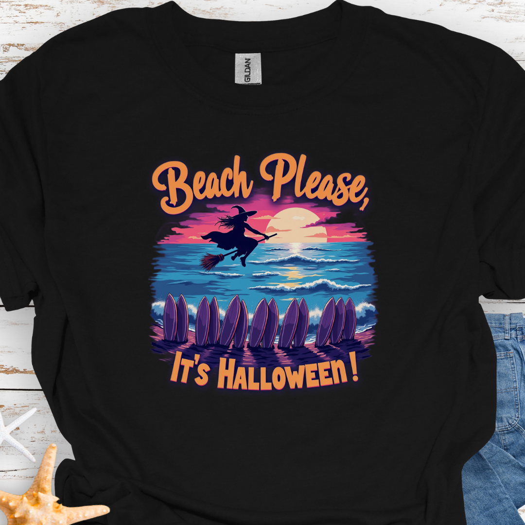 Black T-shirt with image of witch flying on a broom over the ocean with surfboards in the sand and text that says Beach Please, It's Halloween.