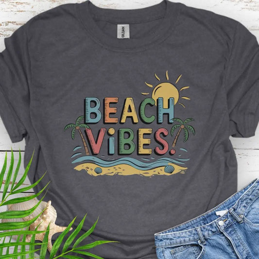 Dark Heather T-shirt with colorful text Beach Vibes with a beach scene with palm trees and the sun.
