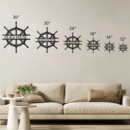Size chart for  metal wall art shaped like a ship wheel with the words “Beach House” cut out in the center, available in multiple colors and sizes.