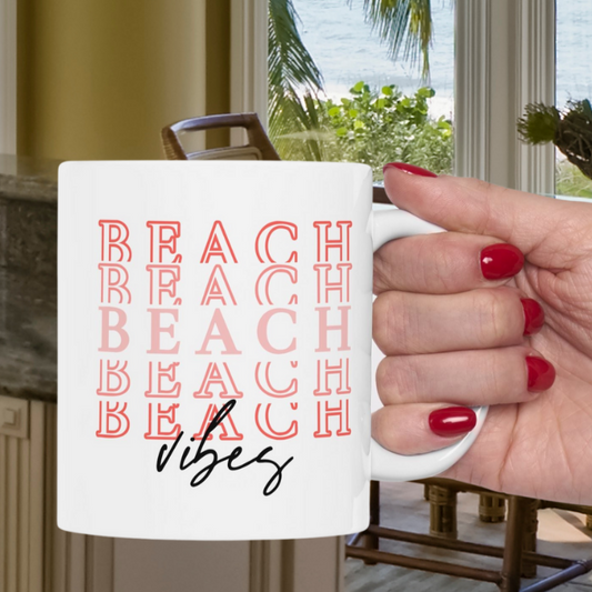 White 11 oz. Mug with Beach Repeated 5 times and Vibes written at bottom.