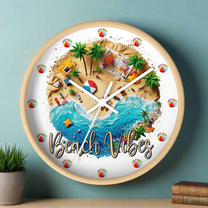 A round wall clock with a wood frame, and wood hands with a beach scene that says Beach Vibes and has beach balls in place of the numbers to show the time.