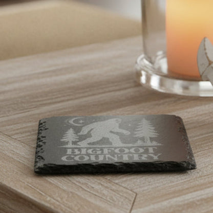 Slate coaster with engraved Bigfoot design and 'Bigfoot Country' text.