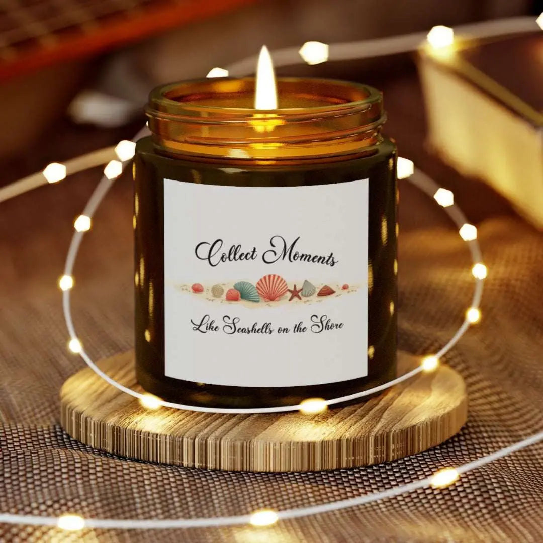 Elegant hand-poured coconut apricot wax scented candle in a 4 oz amber glass jar, featuring the quote "Collect Moments Like Seashells on the Shore" with a seashell design. A cozy beach-inspired gift, perfect for relaxation and decor.