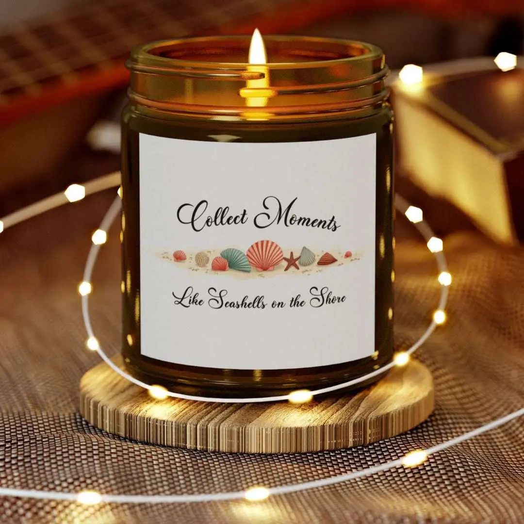 Elegant hand-poured coconut apricot wax scented candle in a 9 oz amber glass jar, featuring the quote "Collect Moments Like Seashells on the Shore" with a seashell design. A cozy beach-inspired gift, perfect for relaxation and decor.