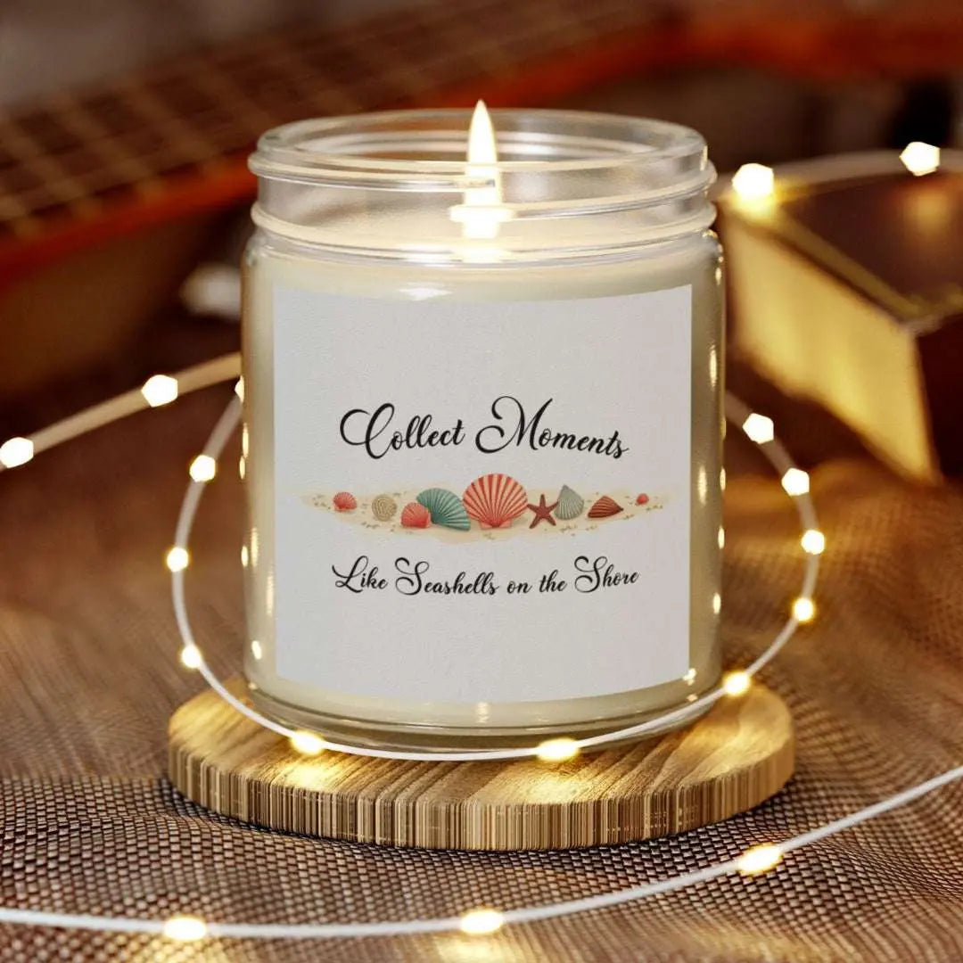 Elegant hand-poured coconut apricot wax scented candle in a glass jar, featuring the quote "Collect Moments Like Seashells on the Shore" with a seashell design. A cozy beach-inspired gift, perfect for relaxation and decor.