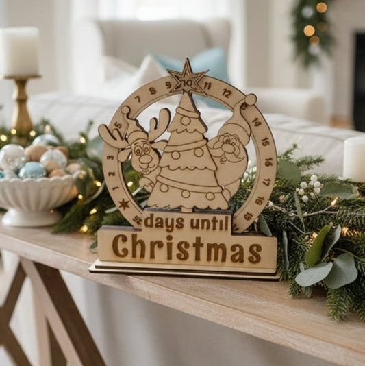 Christmas-themed table setting with decorative elements and a 'days until Christmas' sign.