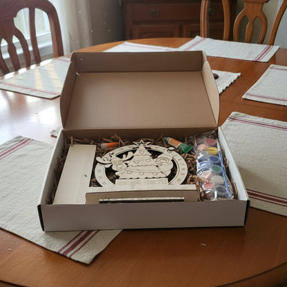 Open box with a product on a wooden dining table in a home setting