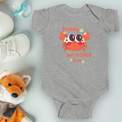 Heather Gray short sleeved body suit with cartoon crab that says crabby but a cutie personalized.