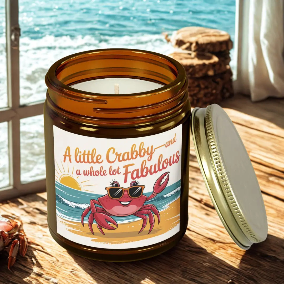 A Little Crabby and A hole Lot Fabulous 9 oz amber candle with a sexy crab wearing glasses on the beach.